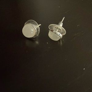 White and silver earrings